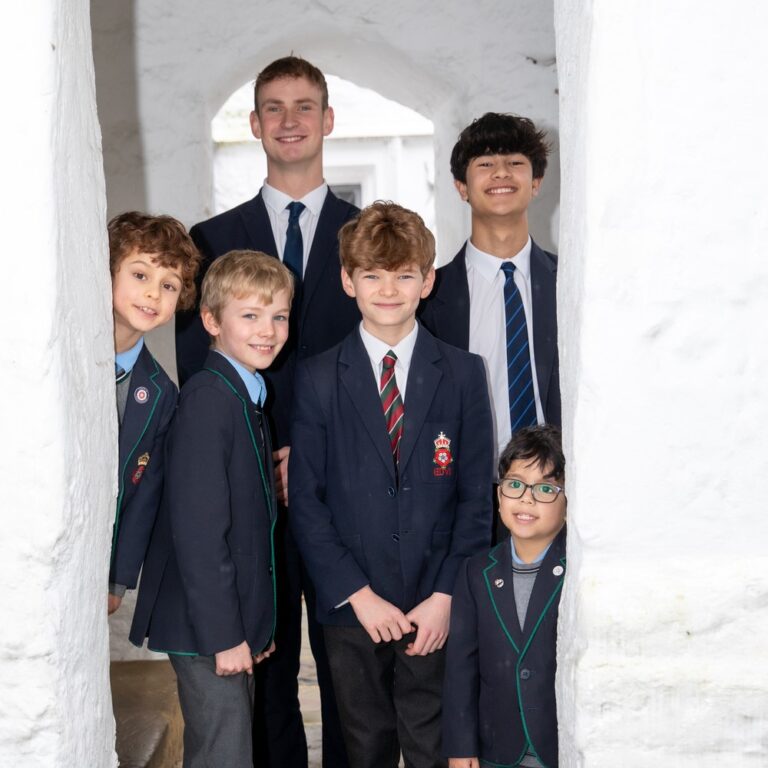 Students in historic courtyard of RGS Guildford