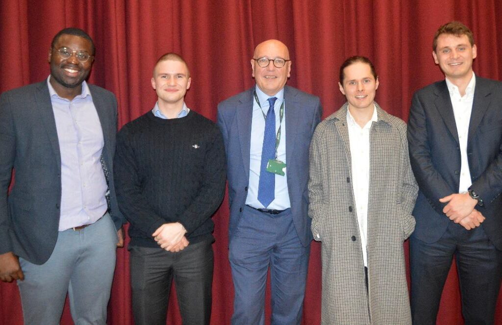 men lined up for a photo