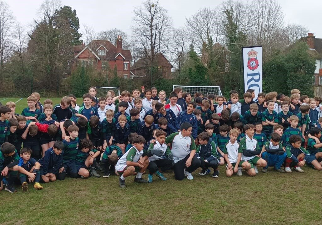 big group of students preparing for a game of football