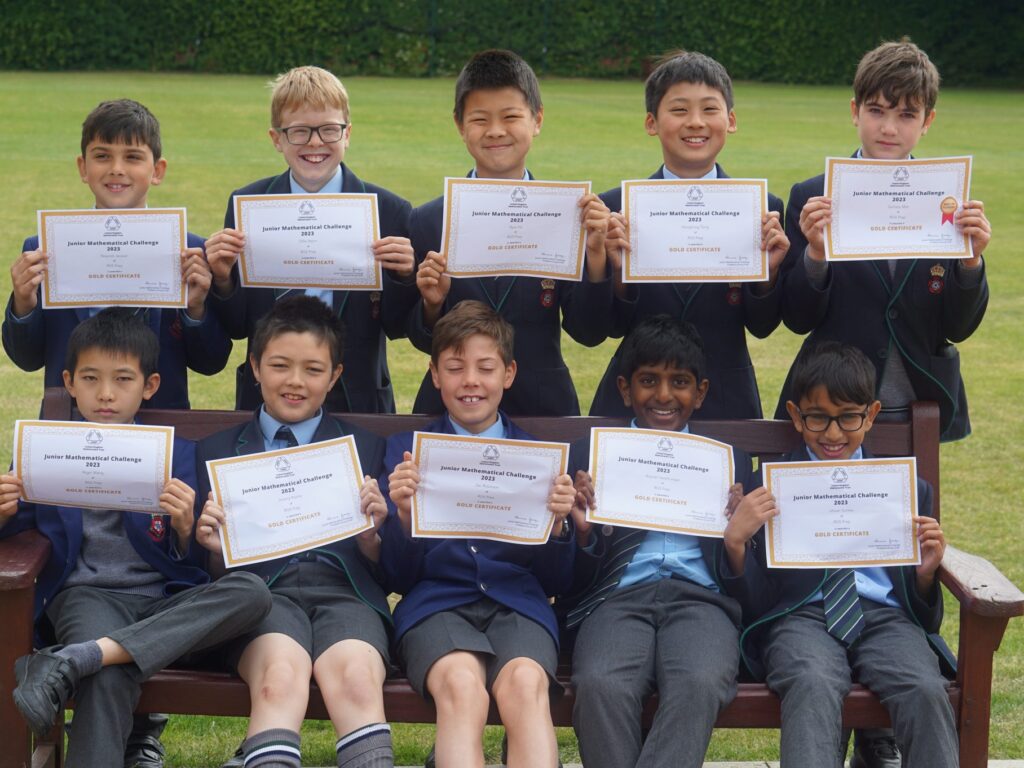 students holding certificates