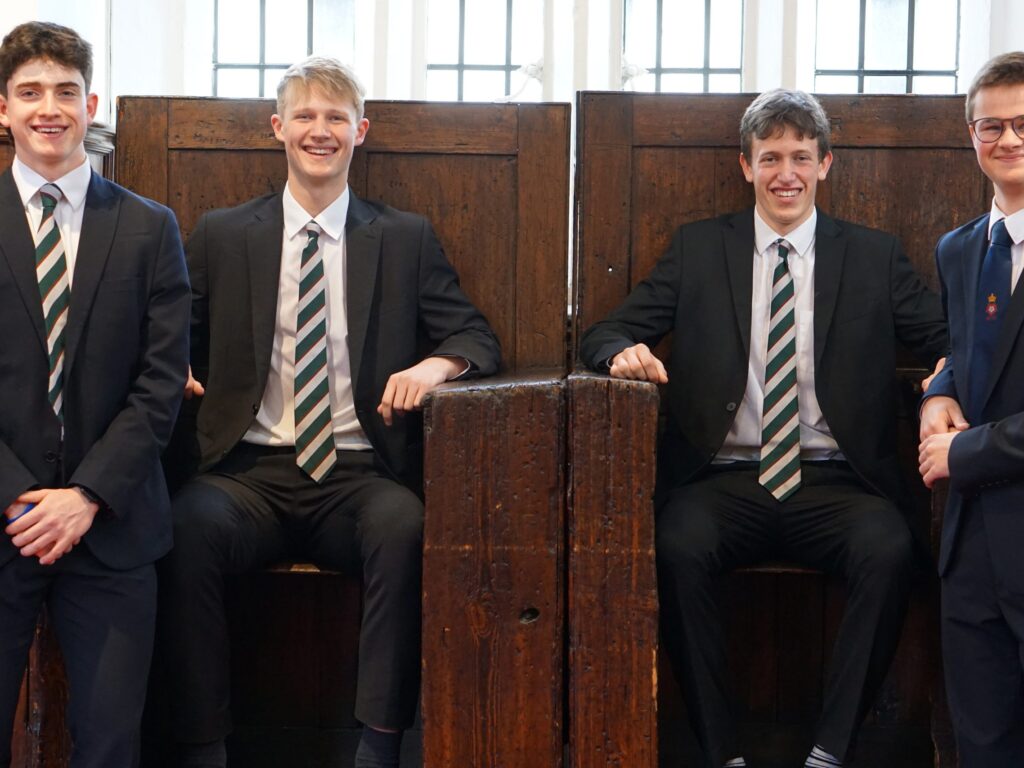 students sat on big chairs