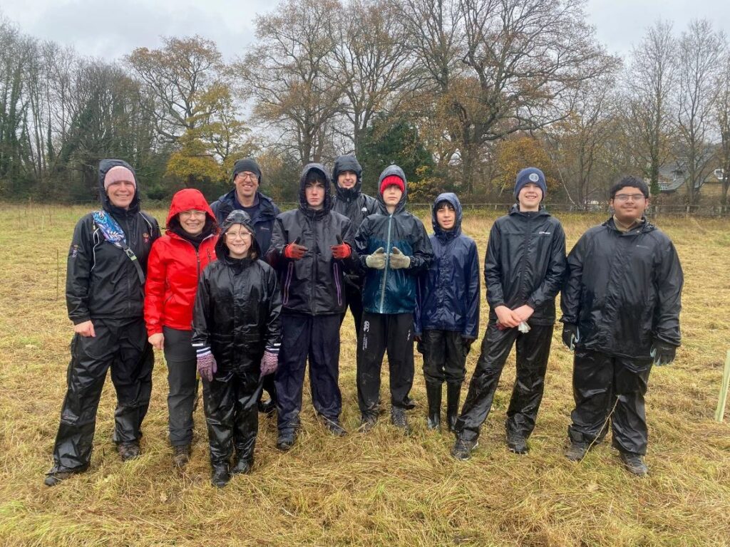 students in the rain